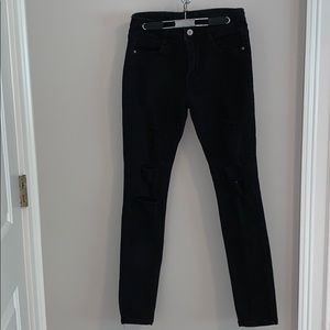 Black jeans with holes